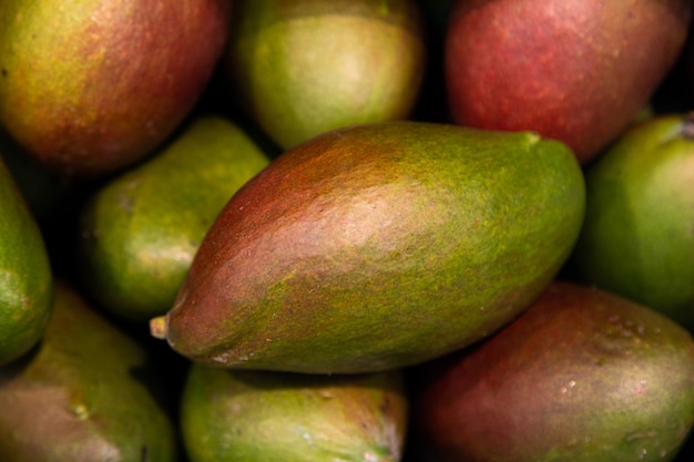 Raw fresh green delicious sweet mango close-up