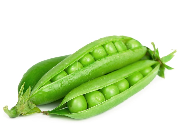 Raw green peas in pods isolated on the white background