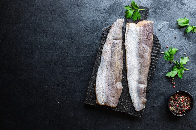 Raw hake fish fillet seafood omega  on the table healthy meal