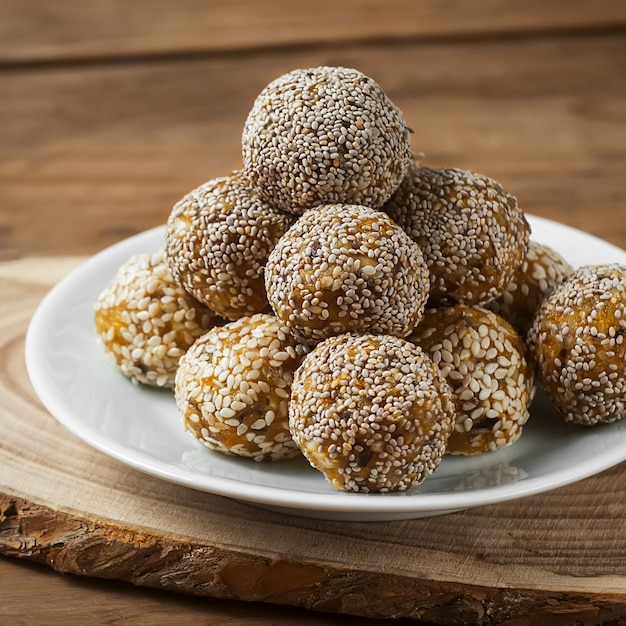 Raw healthy vegetarian and vegan food. Organic snack bites with dried fruits, nuts and honey. Energy balls