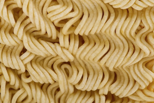 Raw instant noodles close up instant noodles texture for background