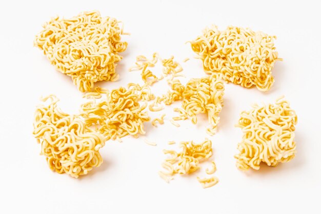 Raw instant noodles on white background