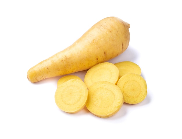 Raw mandioquinha or arracacha with slices isolated over white background