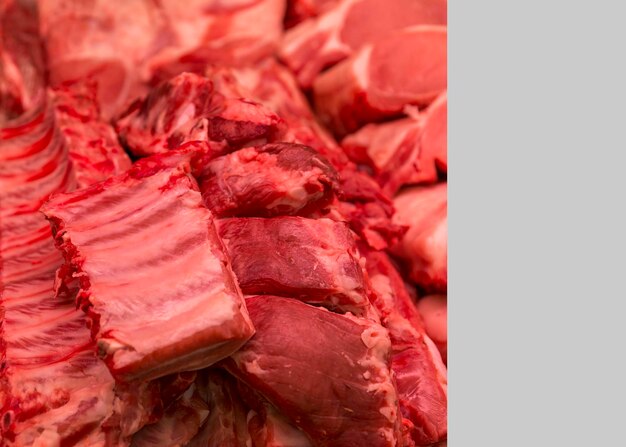 Raw meat ribs on the counter Healthy food Closeup Space for text on a light gray background