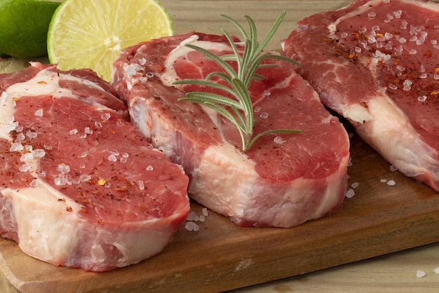 Raw meat steak with seasonings