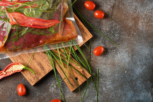 Raw meat with ingredients for cooking, top view