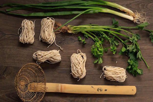 Raw Mie Ayam, Indonesian Popular Street Food with Noodle Knolling Concept