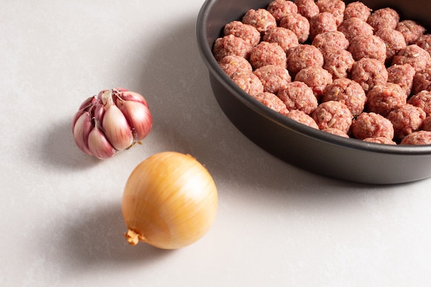 Raw minced meatballs ready to prepary cooking concept on clear background