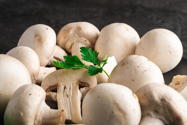 Raw mushrooms with parsley