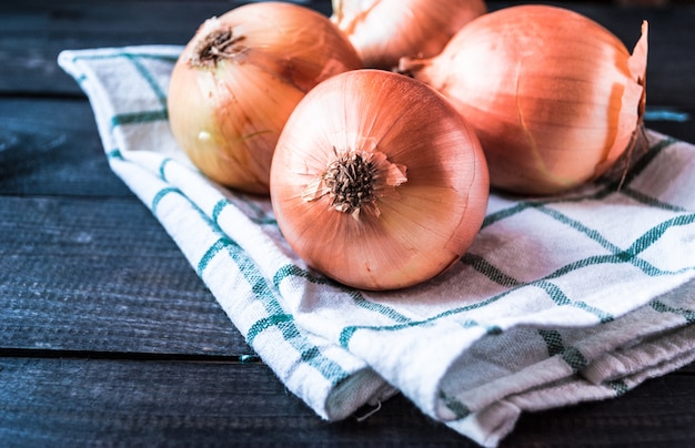 Raw onions on a table