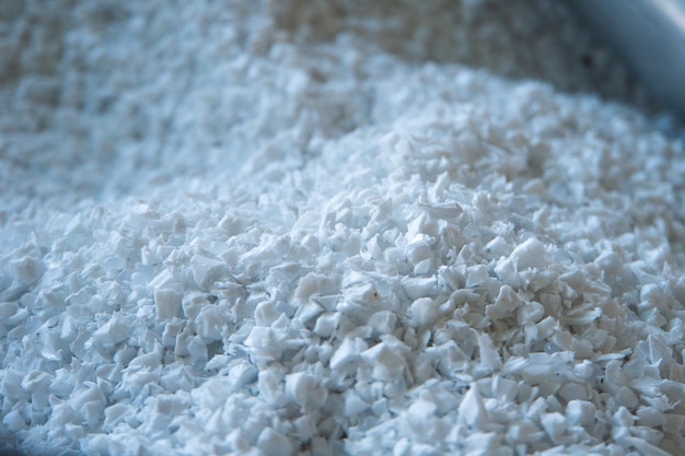 Raw plastic material white granules in metal box