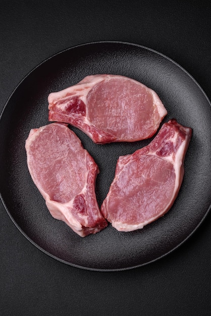 Raw pork on the bone or rib sliced with salt spices and herbs