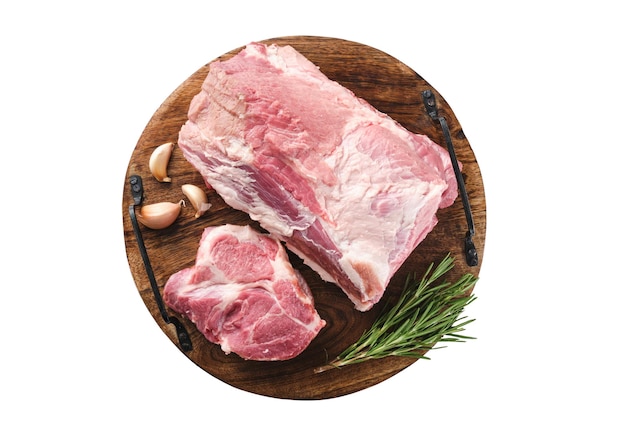 Raw pork neck meat on wooden board Chop steak White background