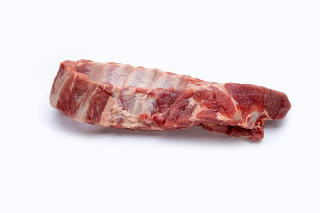 Raw pork ribs on white background.