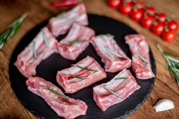 raw pork ribs on wooden background