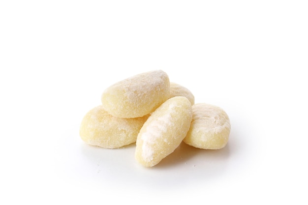 Raw potato gnocchi isolated on white background