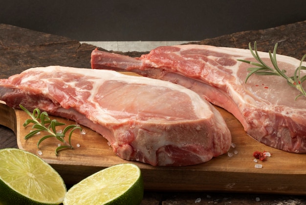 Raw prime rib steak on cutting board Selective focus