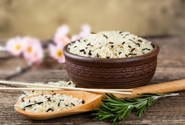 Raw rice grains on a white background