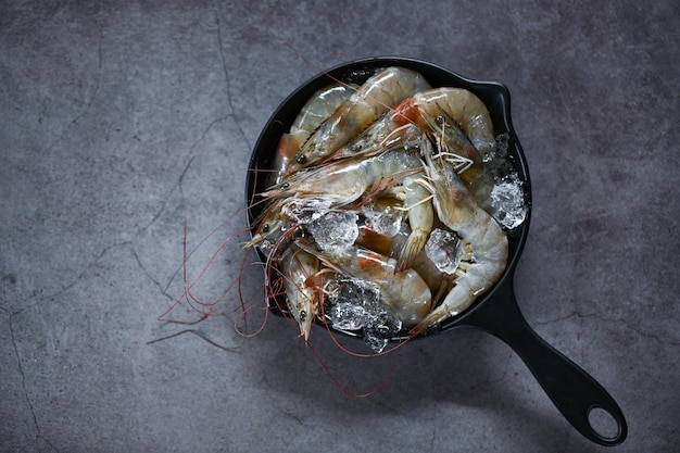 Raw shrimps prawns on ice in bowl Fresh shrimp seafood white shrimp