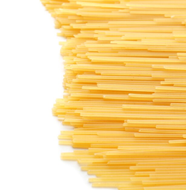 Raw spaghetti on white background