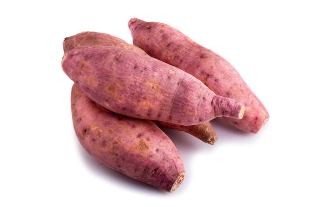 Raw sweet potatoes isolated on white