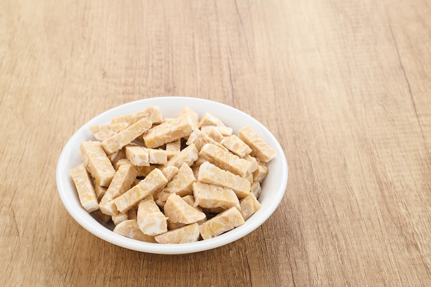 Raw Tempeh, Tempeh or Tempe, Indonesian traditional food, made from fermented soybeans.