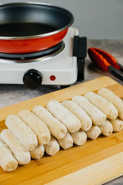 Raw tequenos ready to cook typical Venezuelan snack at parties