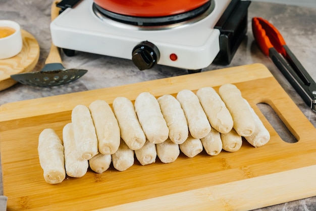 Raw tequenos ready to cook typical Venezuelan snack at parties