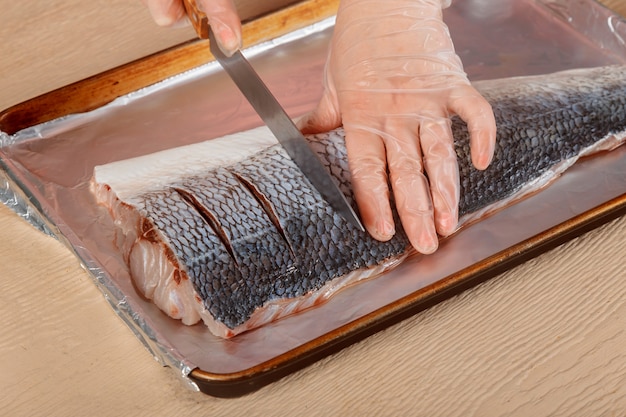 Raw trouts fish the cuts on fish for baking