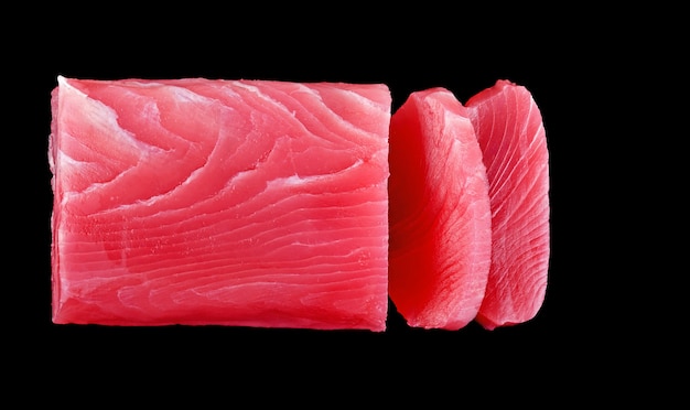 Raw tuna fish isolated on black background