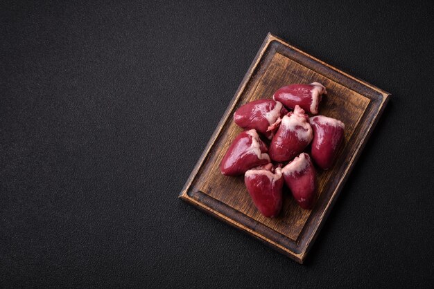 Raw turkey or chicken hearts with salt and spices