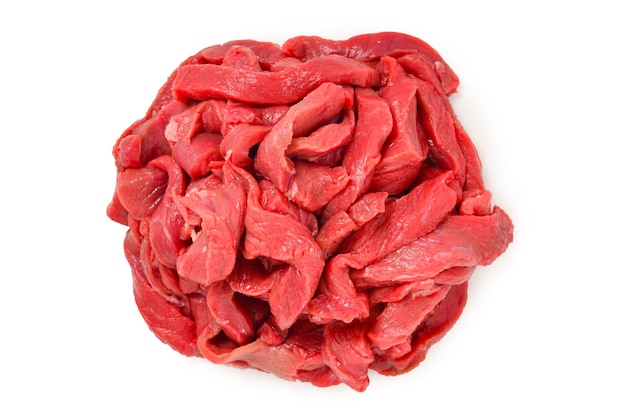 Raw veal pieces background.  Beef stroganoff.