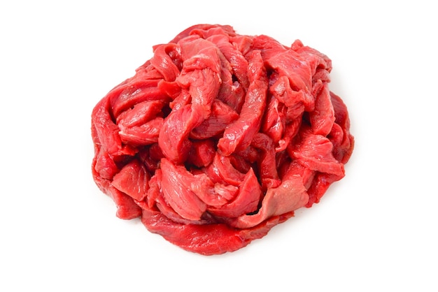 Raw veal pieces background Beef stroganoff