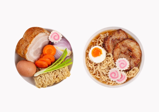 Raw vegetables, egg, meat, uncooked noodles and a bowl with cooked ramen soup ready to eat. Ingredients for making Japanese soup, cooking ramen concept. Top view, white background, isolated objects