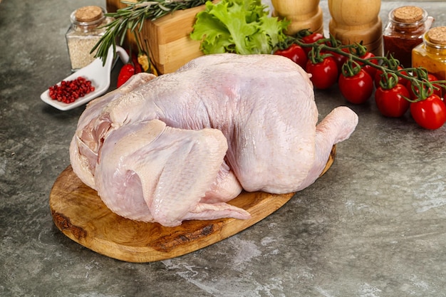 Raw whole chicken for cooking