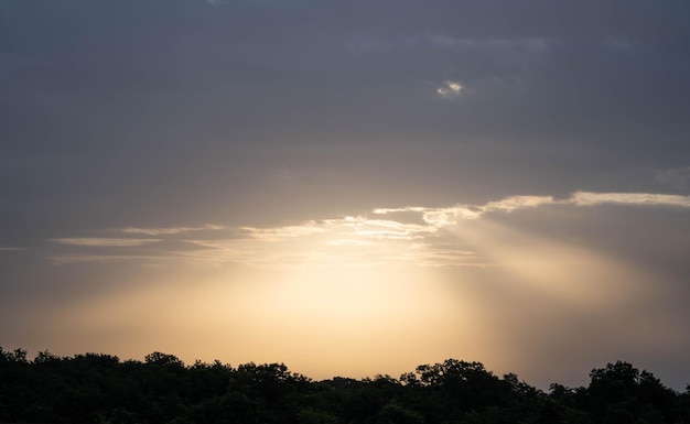 The rays of the sun broke through the clouds