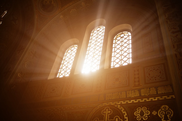 Rays of the sun light in the temple window