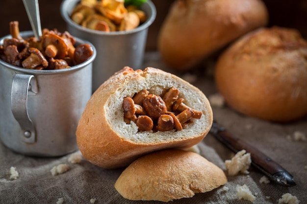 Ready to eat bun with mushrooms made of fresh chanterelles