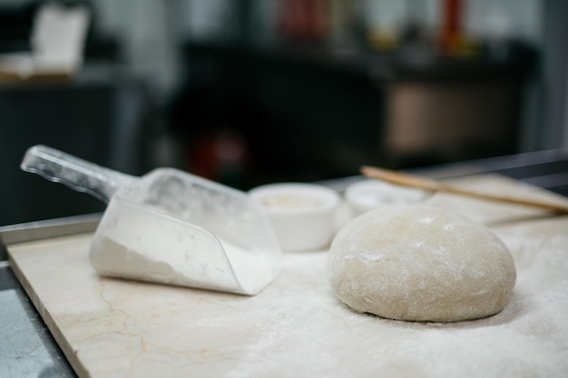 Ready-made dough for baking bread on the table. High quality photo