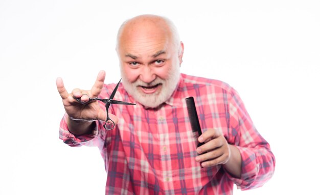 Ready for morning shave. unshaven old man has moustache and beard. barbershop concept. shaving accessories. cut and brush hair. mature bearded man isolated on white. shaving scissors tool kit.