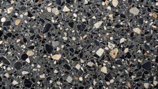 real black terrazzo marble pattern tile for interior flooring material grey terrazzo chips on black background matt rock flooring surface black background with grey chips