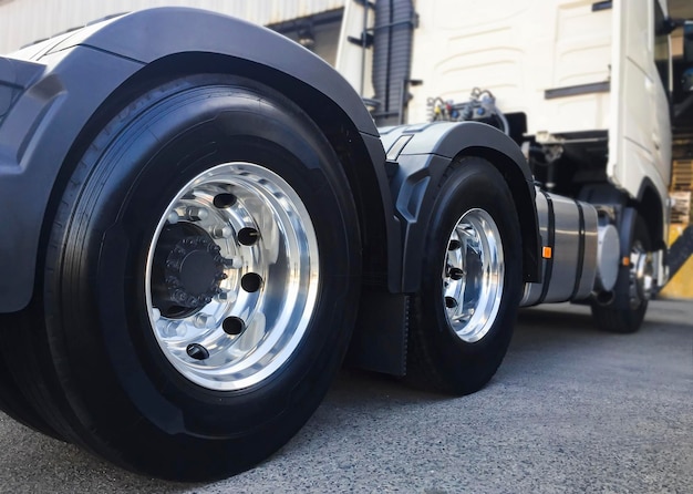 Rear of a Big Semi Truck Wheels Tires Rubber New Tyres with Chrome Wheels