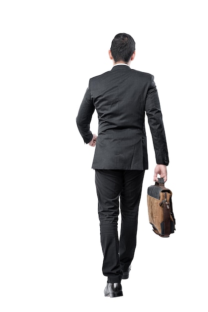 Rear view of Asian businessman walking with carrying briefcase