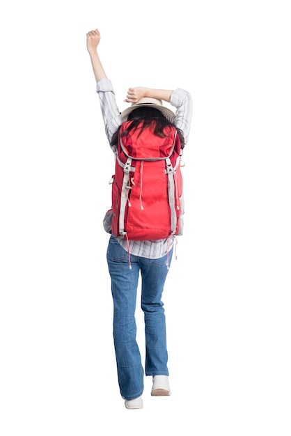 Rear view of Asian woman with hat and backpack standing