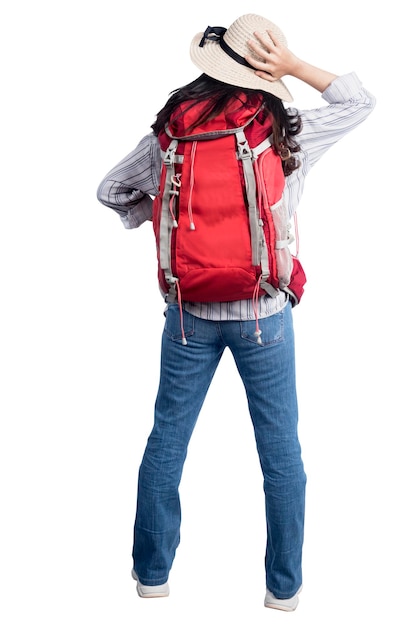 Rear view of Asian woman with hat and backpack standing