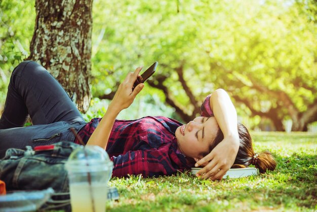 Rear view of man using mobile phone