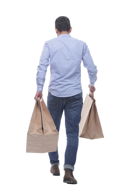 Rear view man with shopping bags walking away