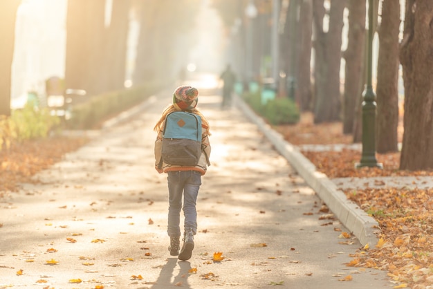 Rear view of school kid