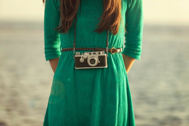 Photo rear view of woman standing on beach