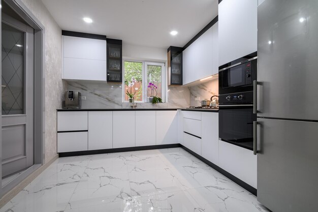 A recently renovated kitchen with sleek modern appliances